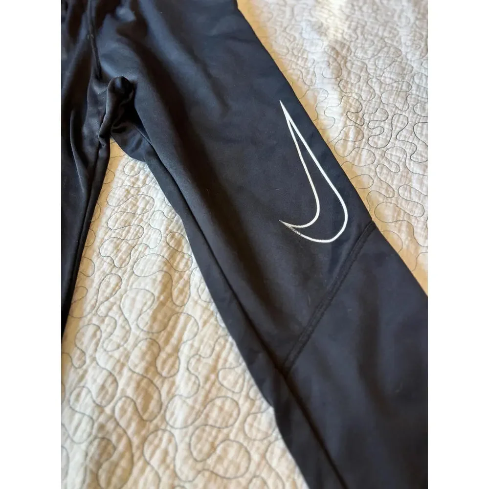 Nike Boy's Size Large Black Athletic Pants with‎ White Swoosh Logo #624